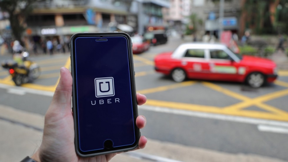 Singapore Fines Uber and Grab